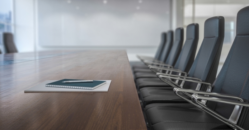 A boardroom with chairs