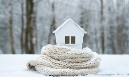 Model house wrapped in a scarf