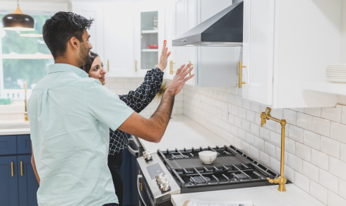 New home buyer inspecting the kitchen